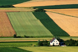 photo of farm house with fields